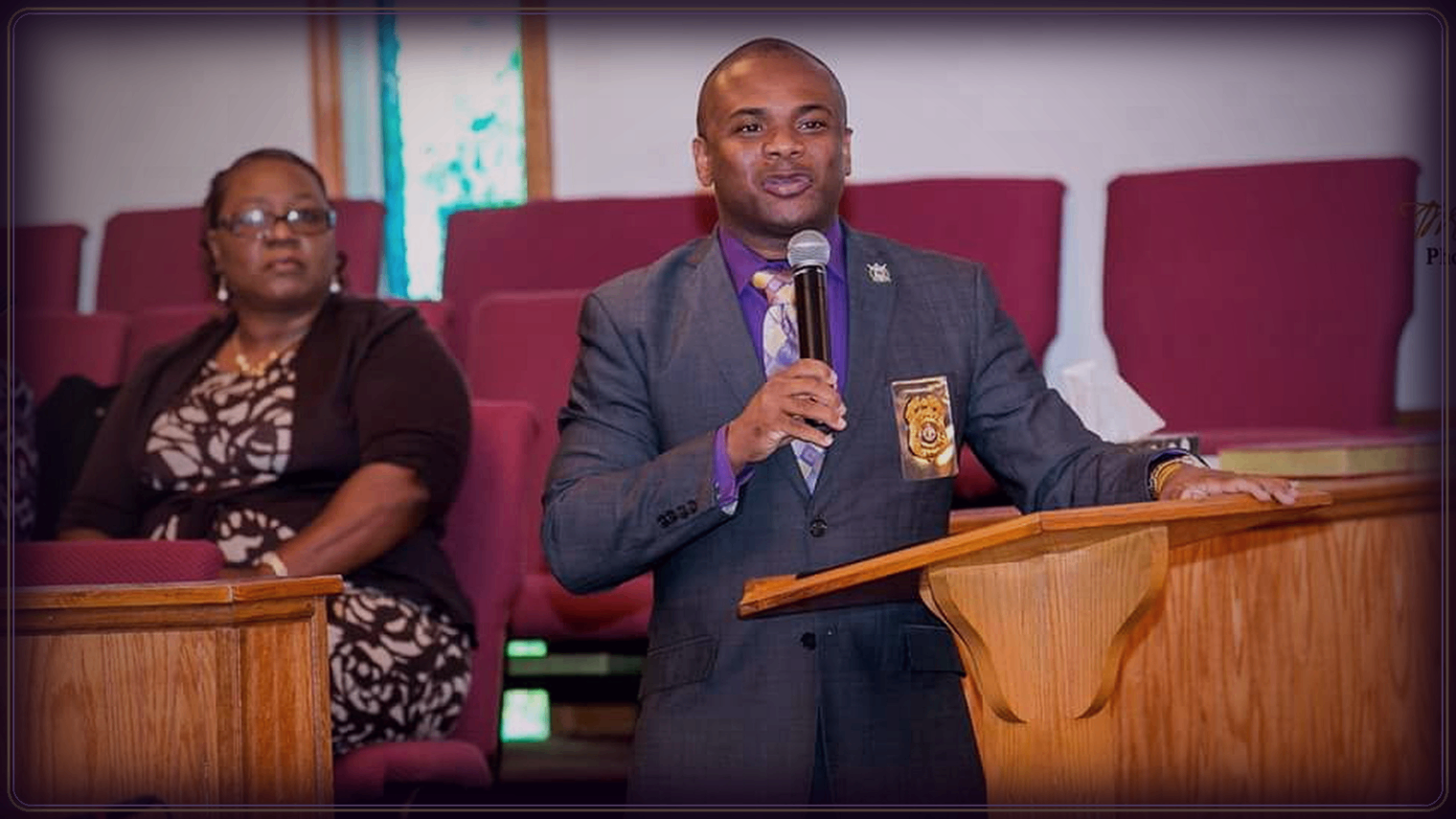 KC Capers speaking at podium — Police Chief